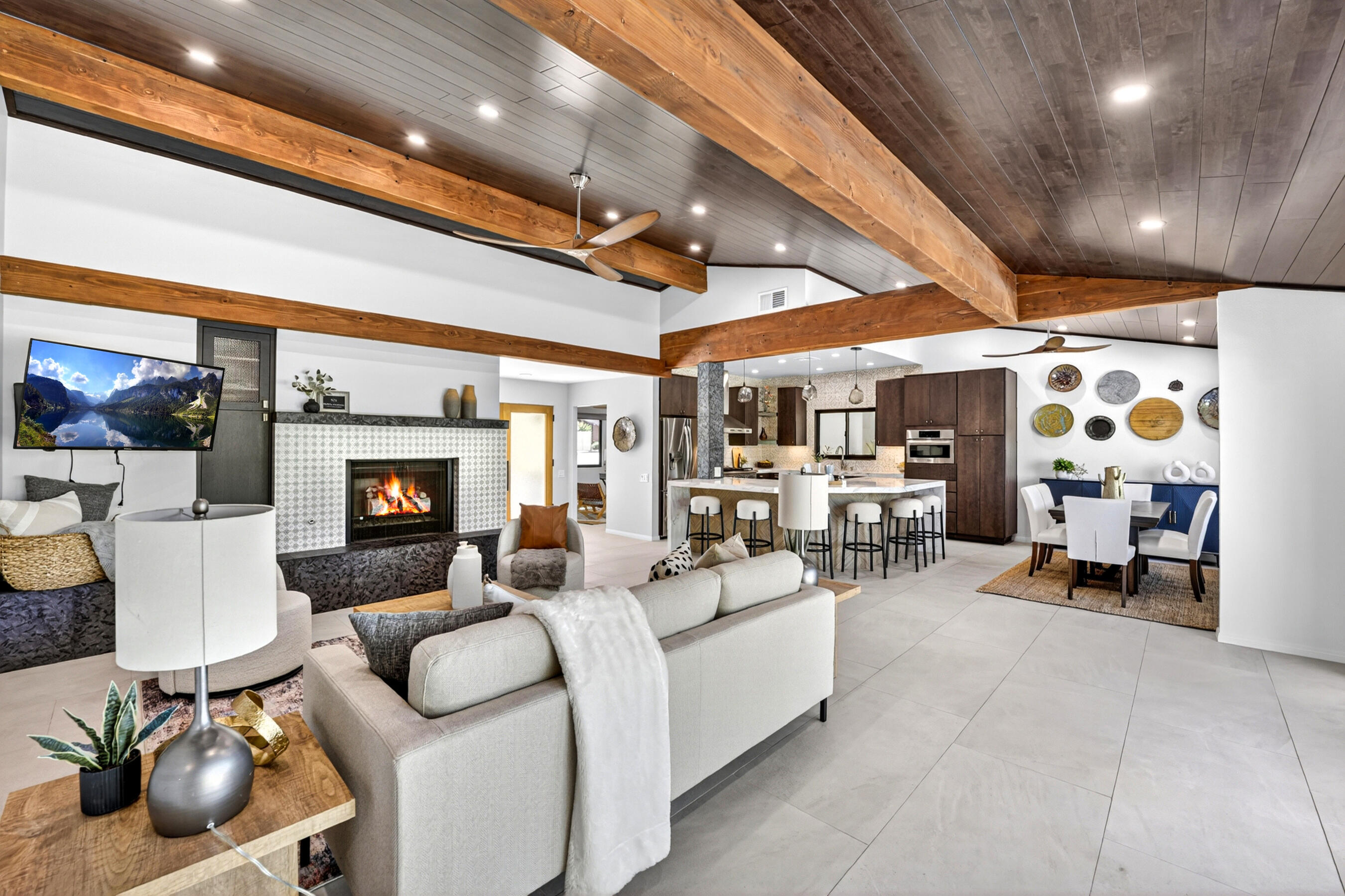 74090 Setting Sun Trail Palm Desert, CA 92260 - Photo 2 of 46 a living room with furniture and a fireplace