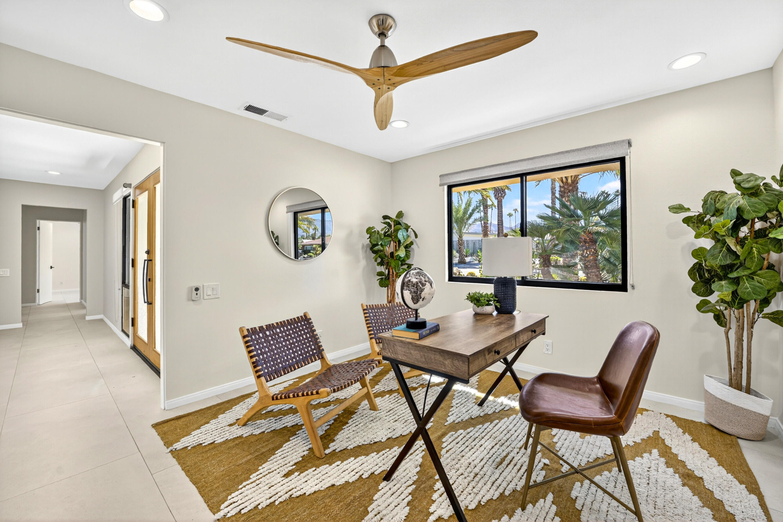74090 Setting Sun Trail Palm Desert, CA 92260 - Photo 21 of 46 a view of a livingroom with furniture and a window