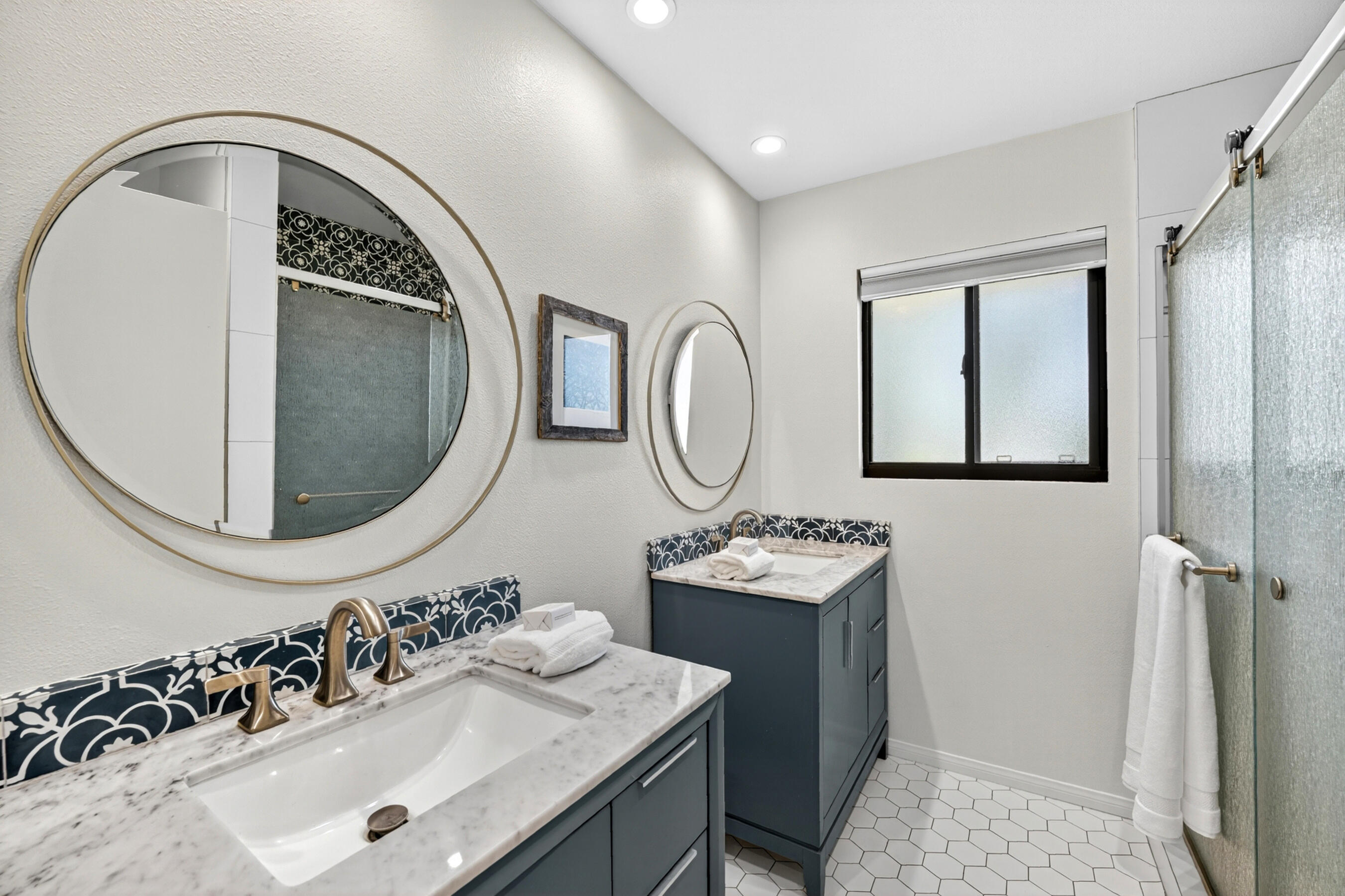 74090 Setting Sun Trail Palm Desert, CA 92260 - Photo 24 of 46 a bathroom with a sink and a mirror