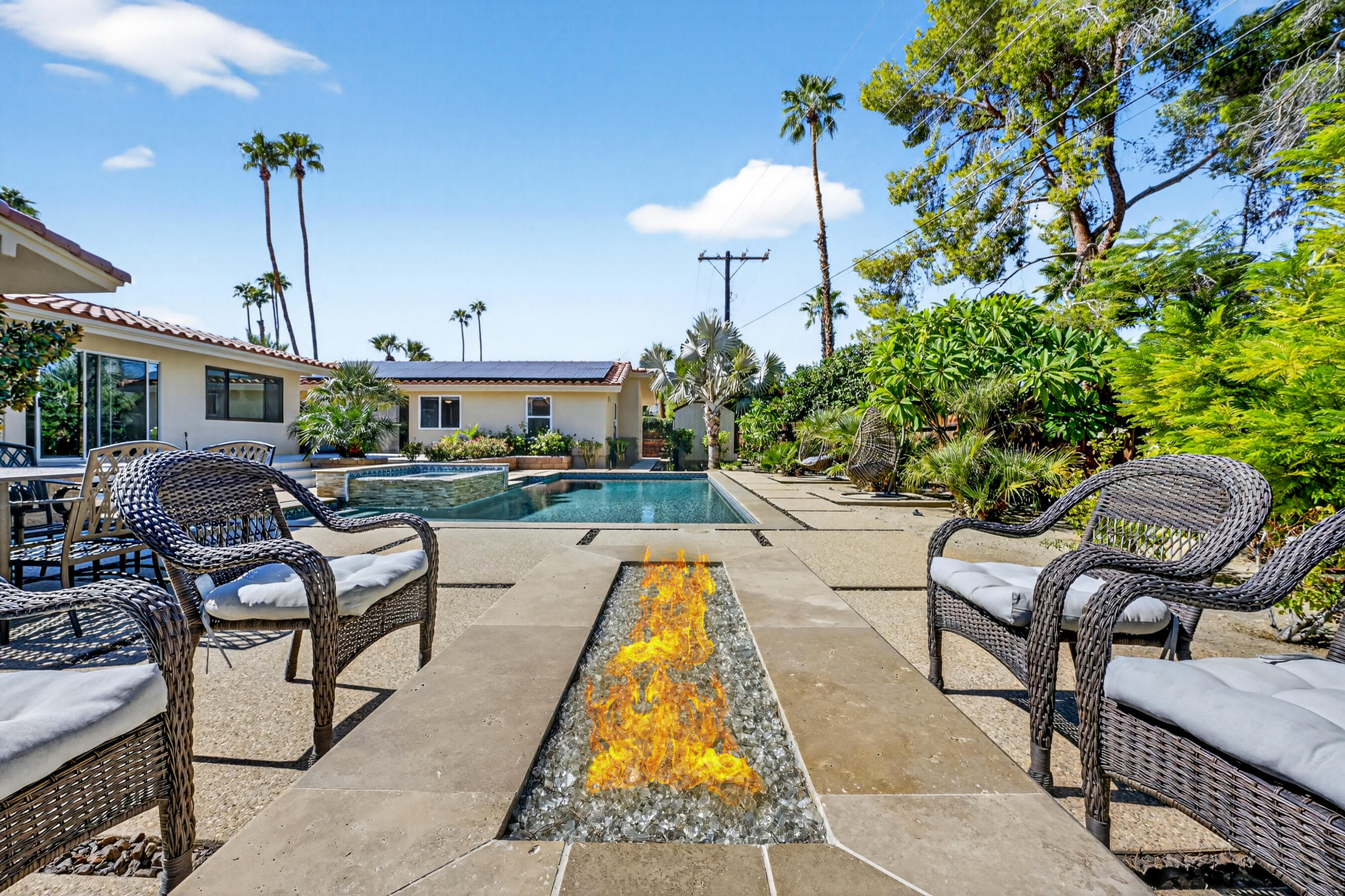 74090 Setting Sun Trail Palm Desert, CA 92260 - Photo 27 of 46 a view of swimming pool with outdoor seating