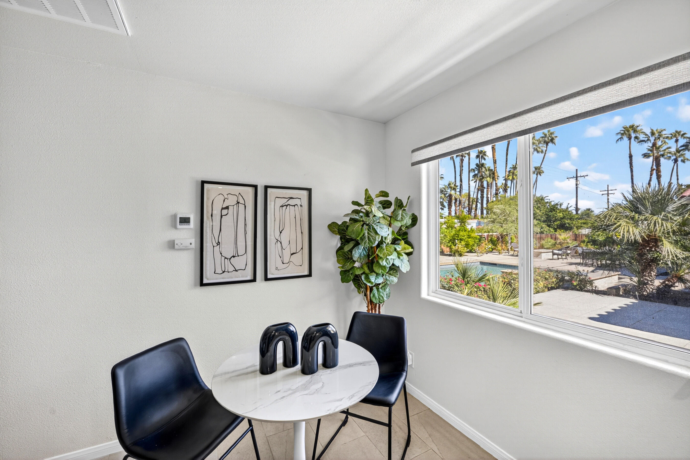 74090 Setting Sun Trail Palm Desert, CA 92260 - Photo 36 of 46 a view of a livingroom with furniture and window