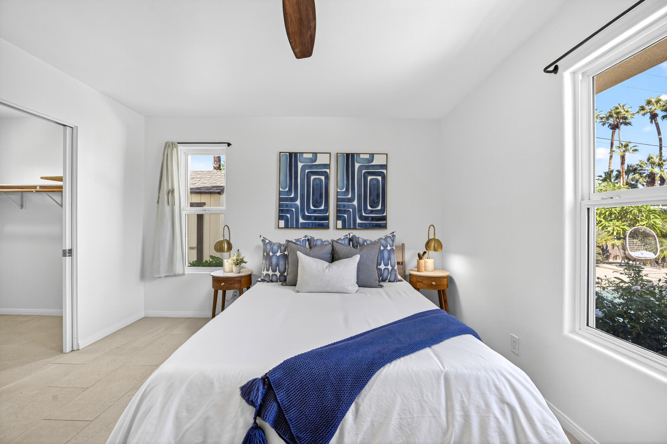 74090 Setting Sun Trail Palm Desert, CA 92260 - Photo 37 of 46 a bedroom with a bed and a window