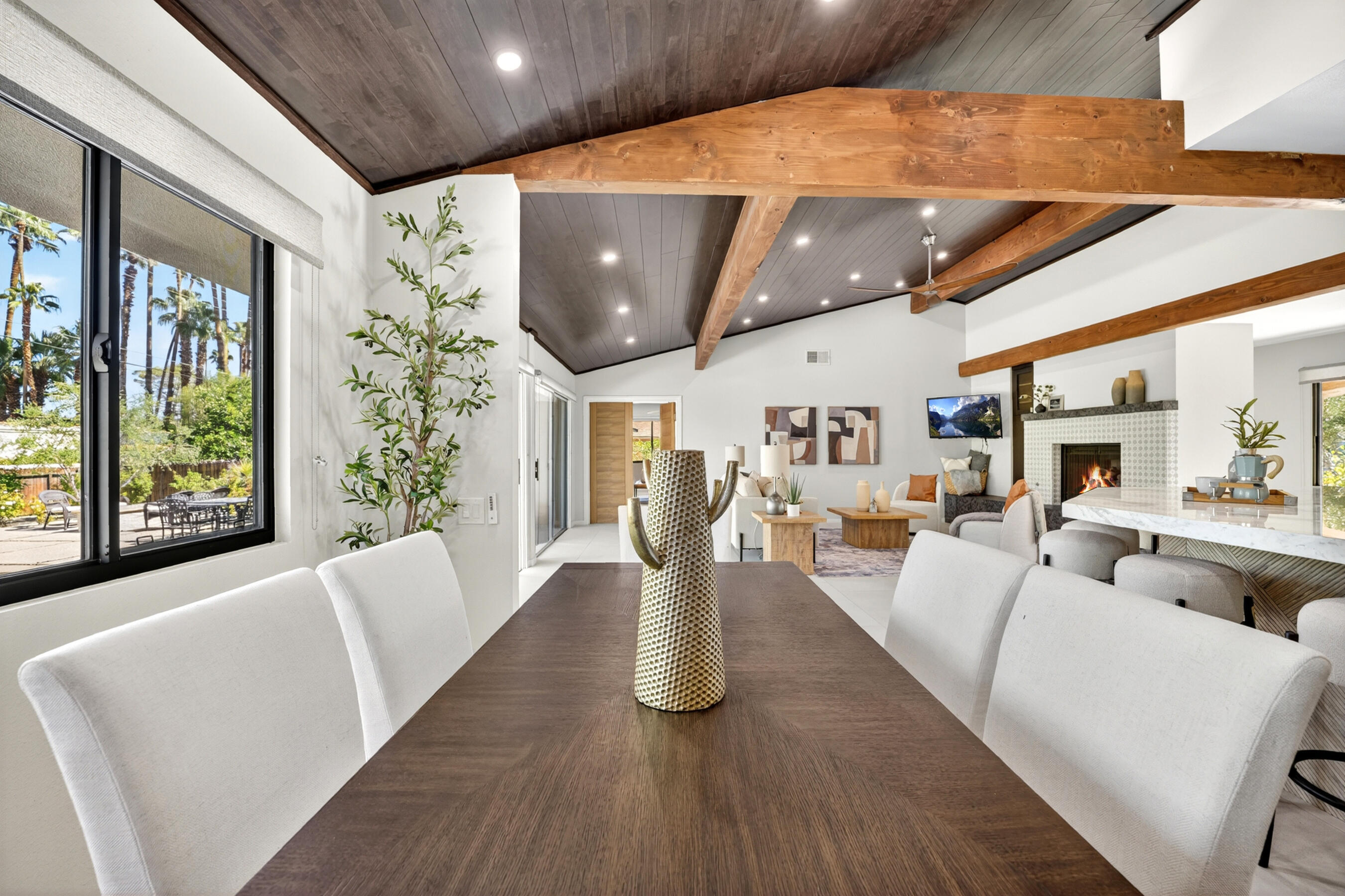 74090 Setting Sun Trail Palm Desert, CA 92260 - Photo 7 of 46 a living room with furniture and wooden floor