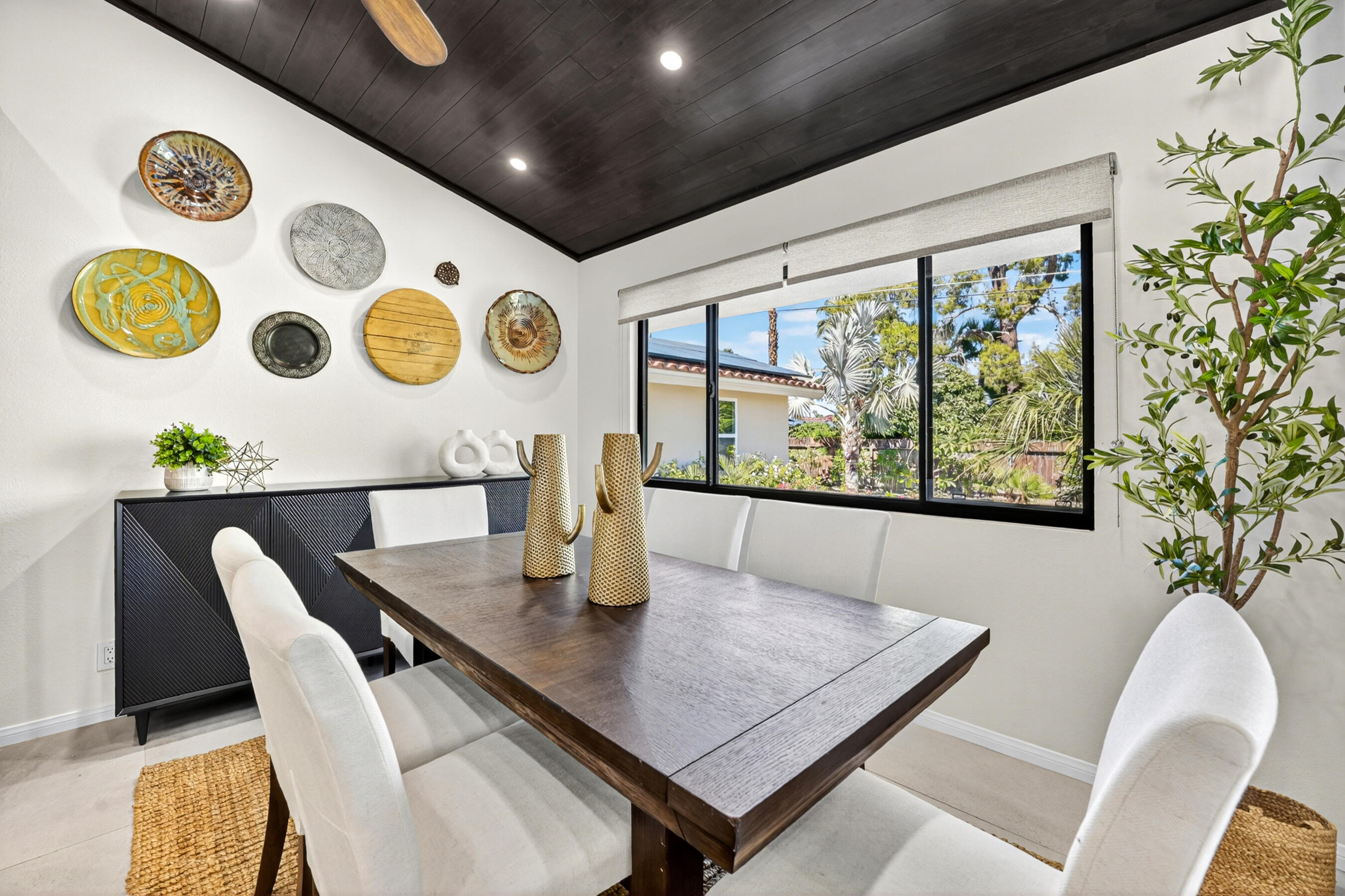 74090 Setting Sun Trail Palm Desert, CA 92260 - Photo 9 of 46 a dining room with window and wooden floor