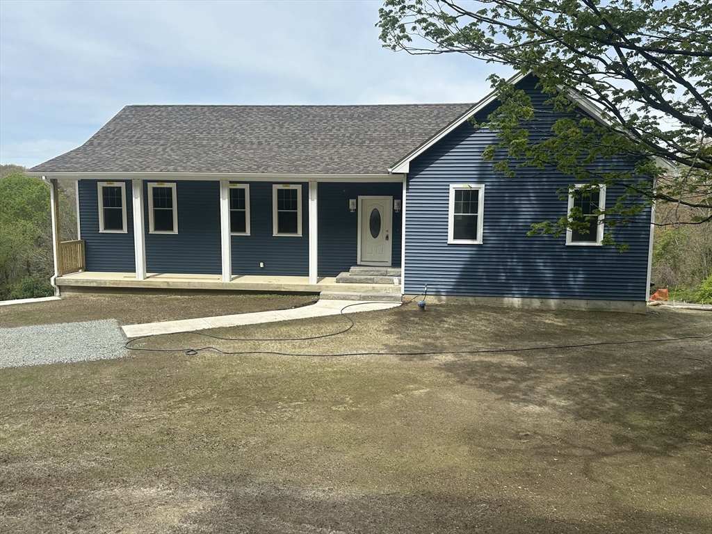 88 Stafford Holland Road Wales, MA 01081 - Photo 2 of 31 a view of a house with a backyard