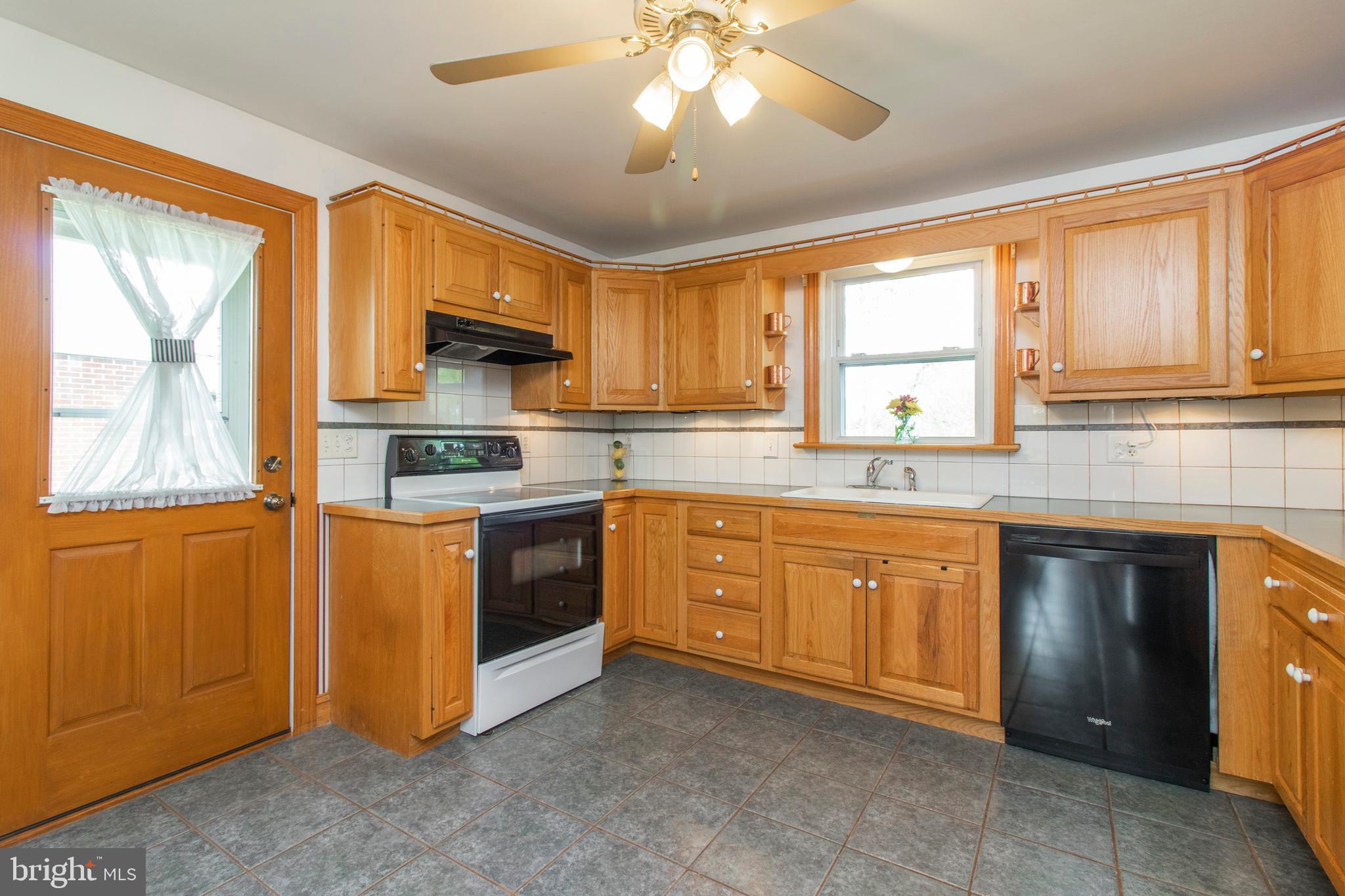 419 Ridge Avenue Souderton, PA 18964 - Photo 16 of 38 Kitchen with door to side/rear yard