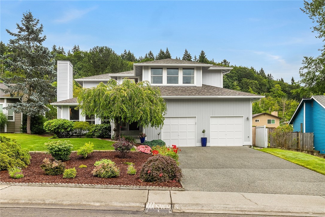 23423 9th Place West Bothell, WA 98021 - Photo 2 of 26 a front view of house with yard and green space