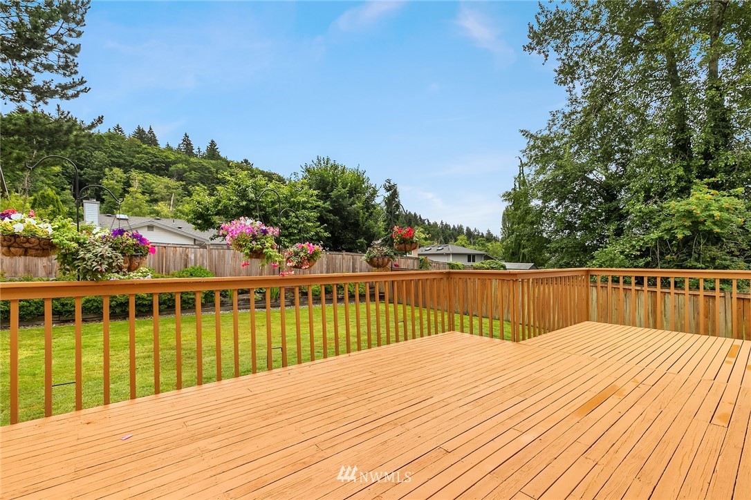 23423 9th Place West Bothell, WA 98021 - Photo 14 of 26 a view of balcony with wooden floor and fence