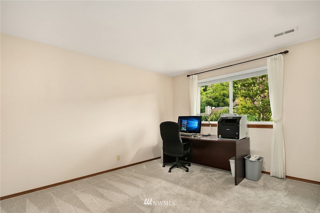 23423 9th Place West Bothell, WA 98021 - Photo 19 of 26 a view of a workspace with furniture and a window