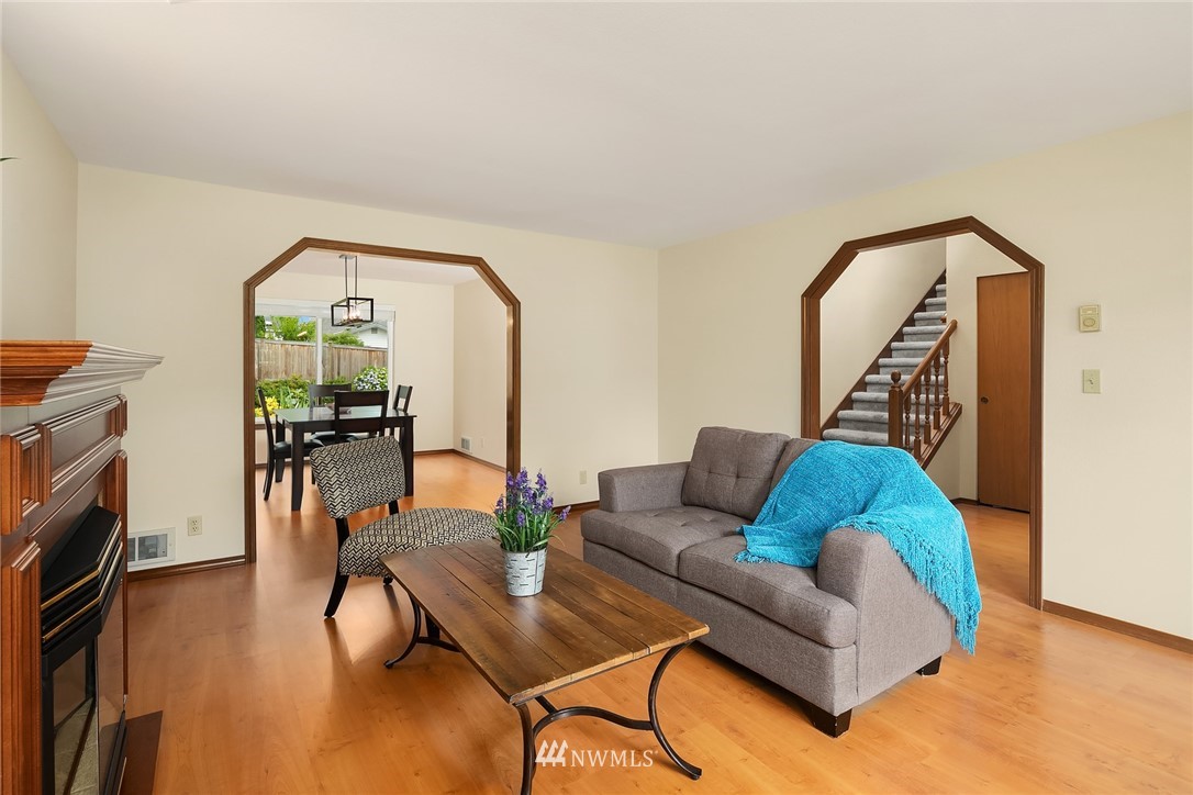 23423 9th Place West Bothell, WA 98021 - Photo 3 of 26 a living room with furniture and a floor to ceiling window