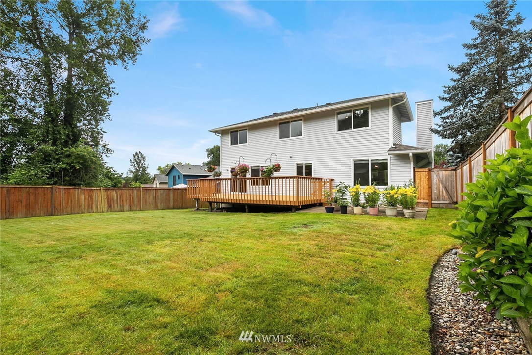 23423 9th Place West Bothell, WA 98021 - Photo 25 of 26 a backyard of a house with seating space