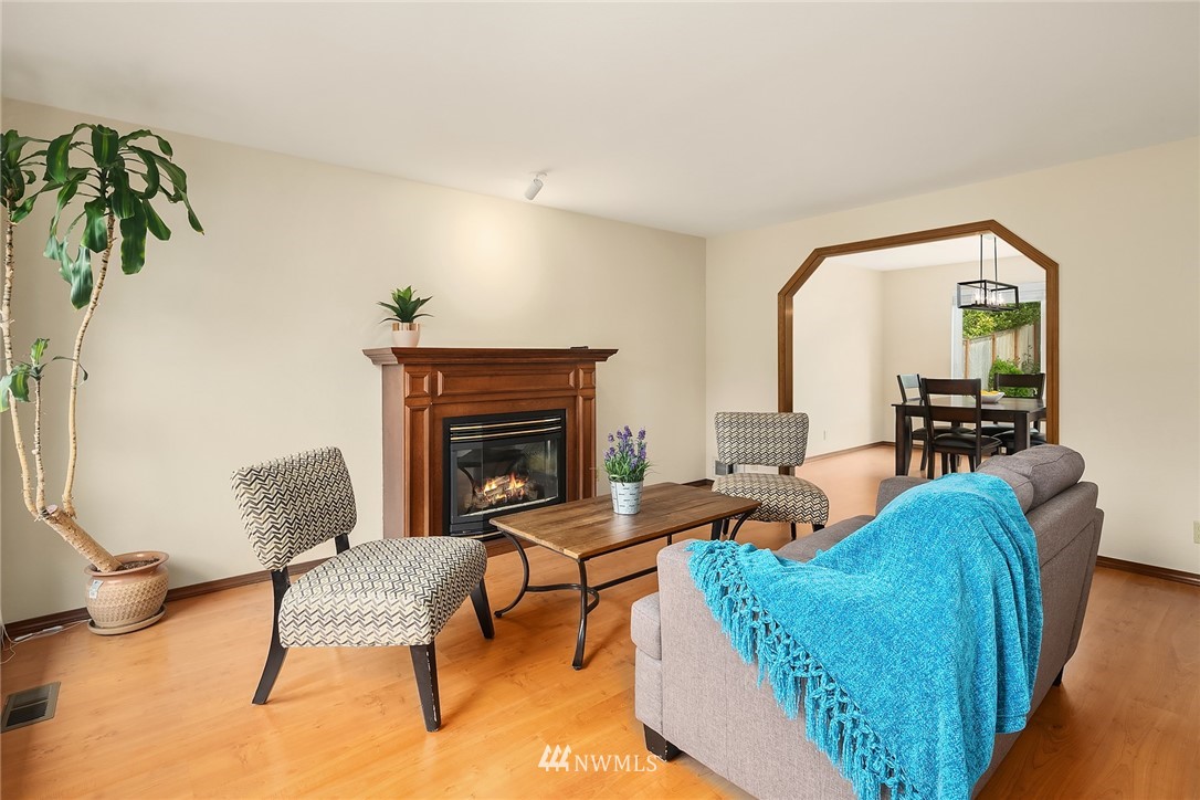 23423 9th Place West Bothell, WA 98021 - Photo 4 of 26 a living room with furniture and a fireplace