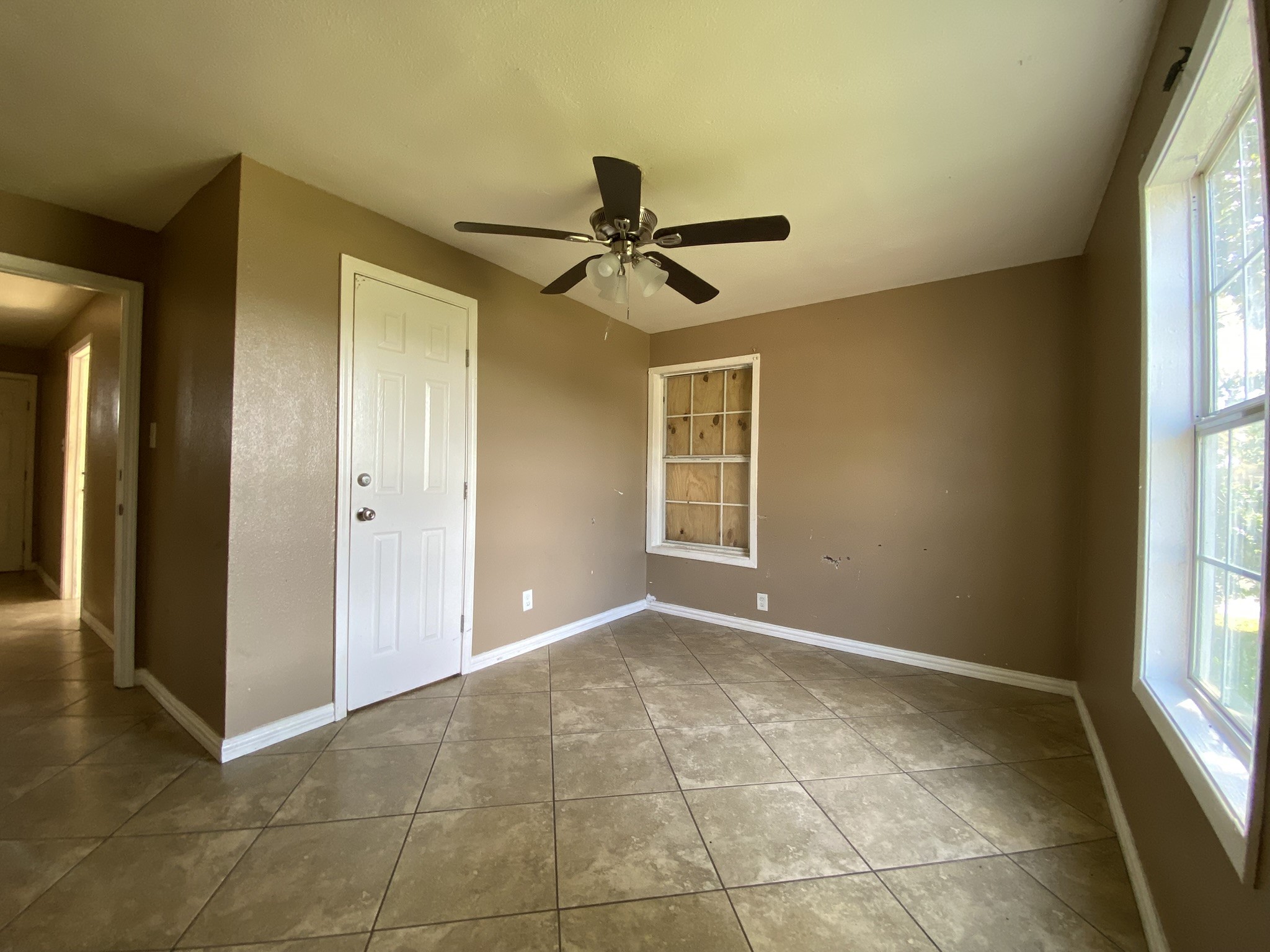3013 Fern Street Pasadena, TX 77503 - Photo 8 of 23 a view of an empty room with a window
