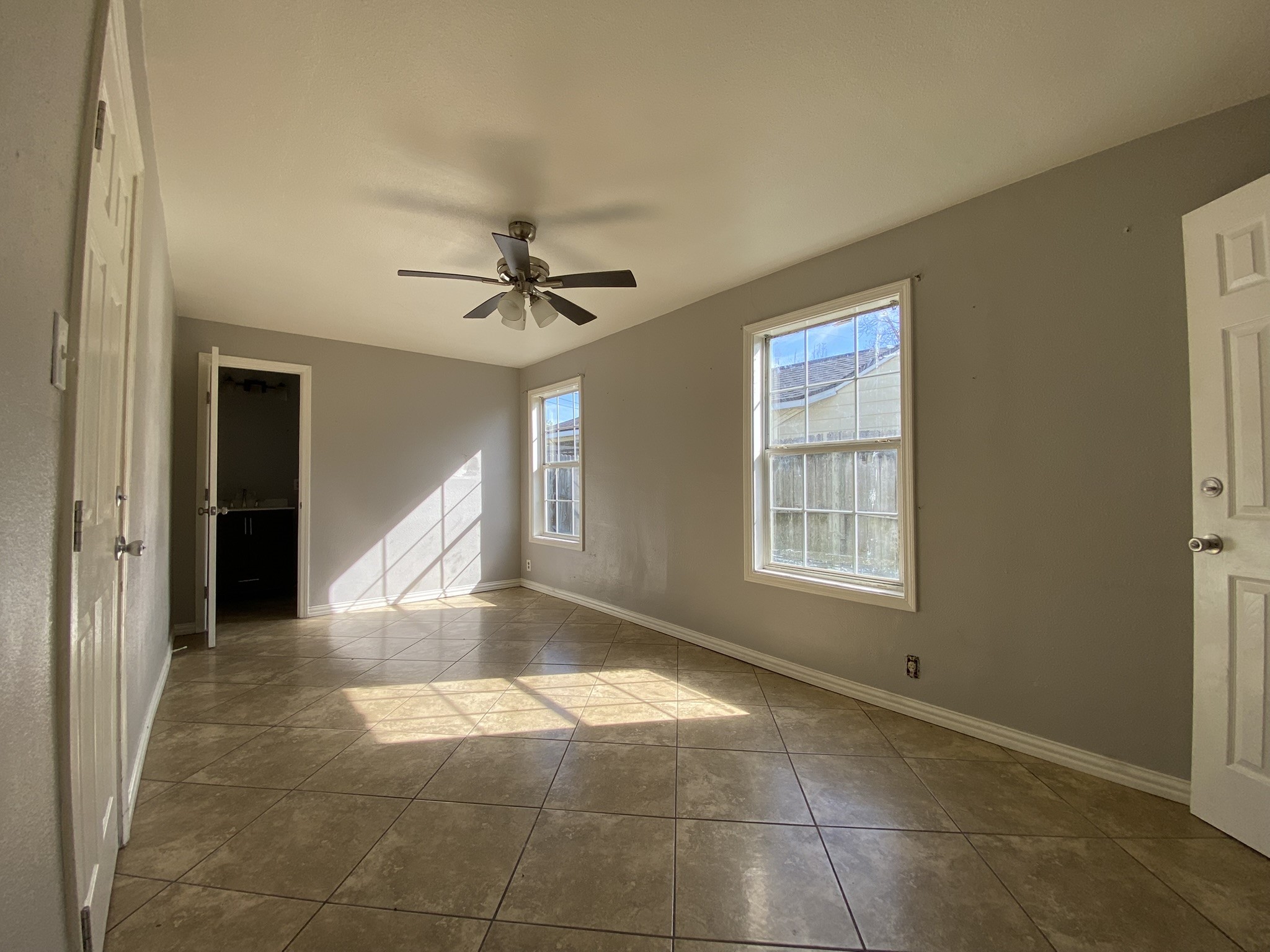 3013 Fern Street Pasadena, TX 77503 - Photo 9 of 23 a view of a livingroom with a ceiling fan and window