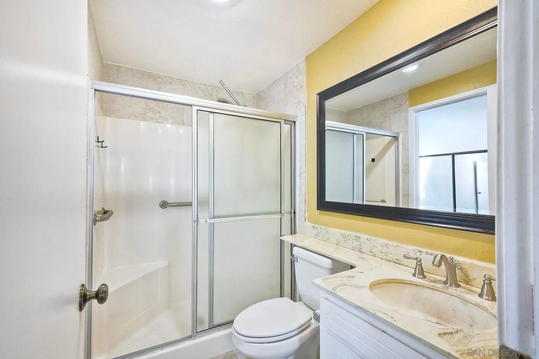 13416 The Square Poway, CA 92064 - Photo 19 of 22 a bathroom with a granite countertop sink toilet and shower