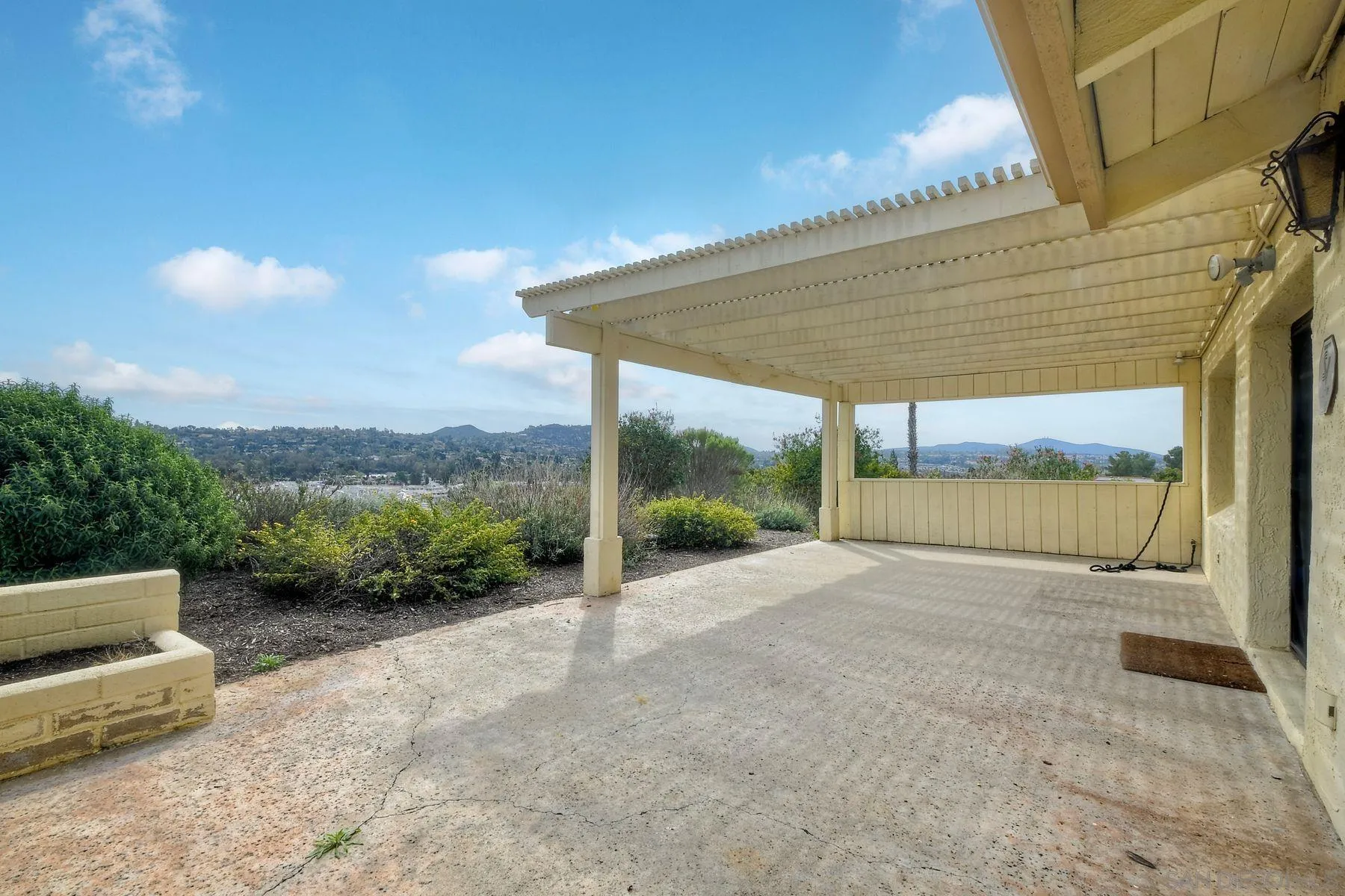 13416 The Square Poway, CA 92064 - Photo 20 of 22 a view of a backyard with porch