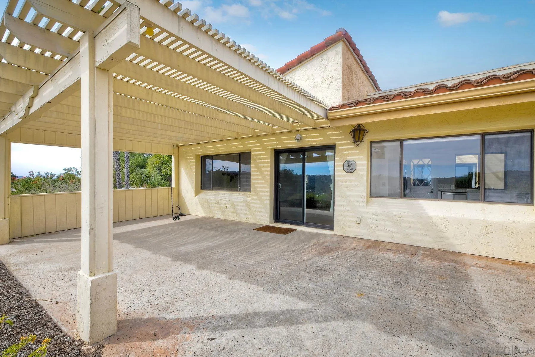 13416 The Square Poway, CA 92064 - Photo 21 of 22 a view of a building with a porch