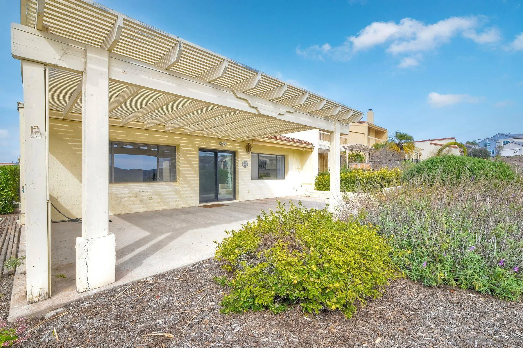13416 The Square Poway, CA 92064 - Photo 22 of 22 a front view of a house with garden