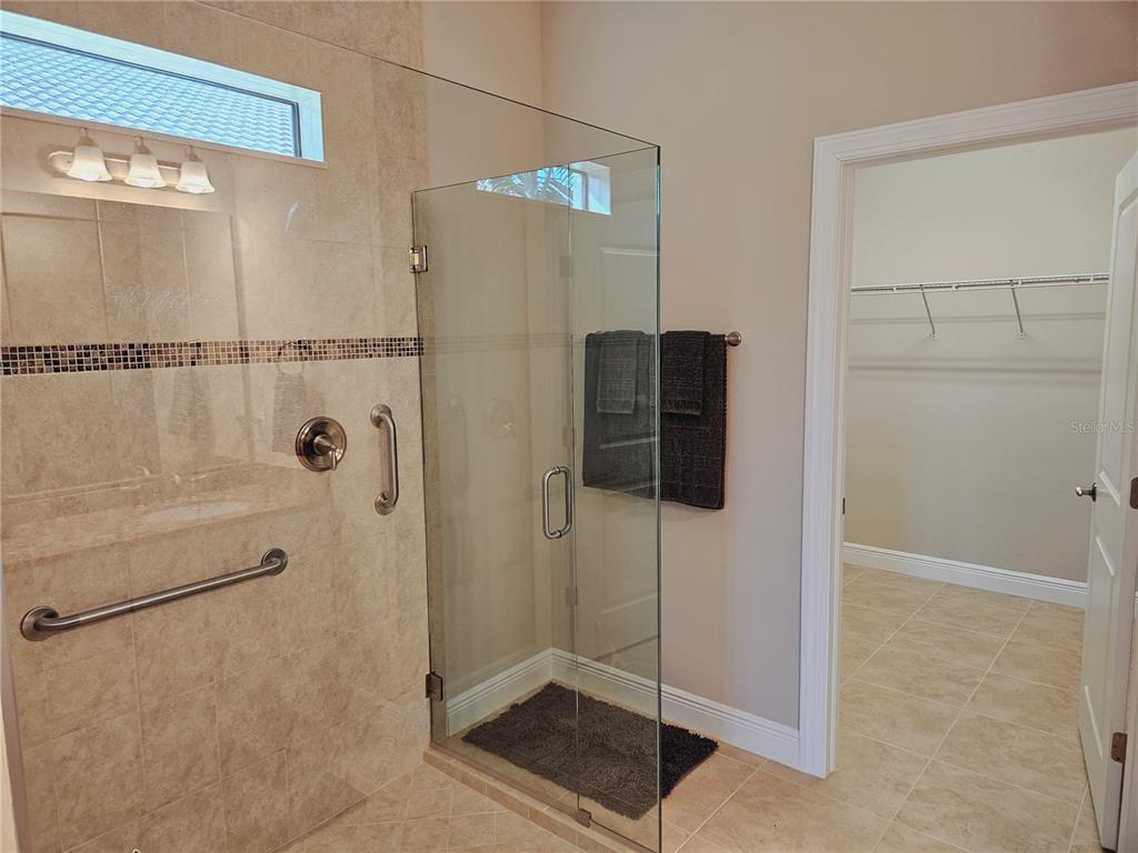 10468 Crooked Creek Drive Venice, FL 34293 - Photo 31 of 44 a bathroom with a shower