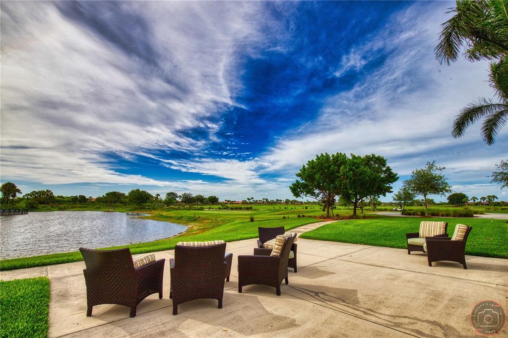 10468 Crooked Creek Drive Venice, FL 34293 - Photo 43 of 44 an outdoor view of a garden with an outdoor seating