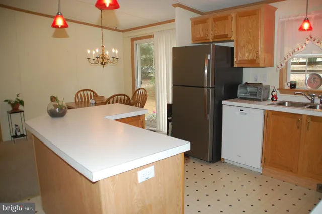 a bedroom with a bed and a table in it