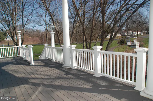 a view of a deck with a fence