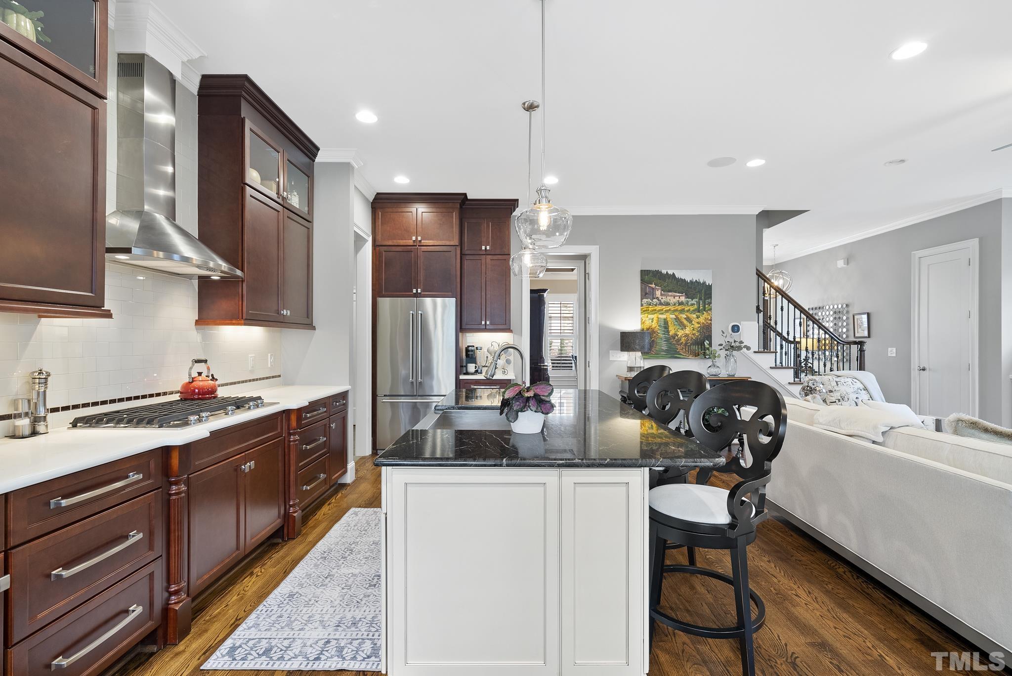2524 Highgate Oak Drive Cary, NC 27519 - Photo 24 of 70 a kitchen with a sink stove and cabinets