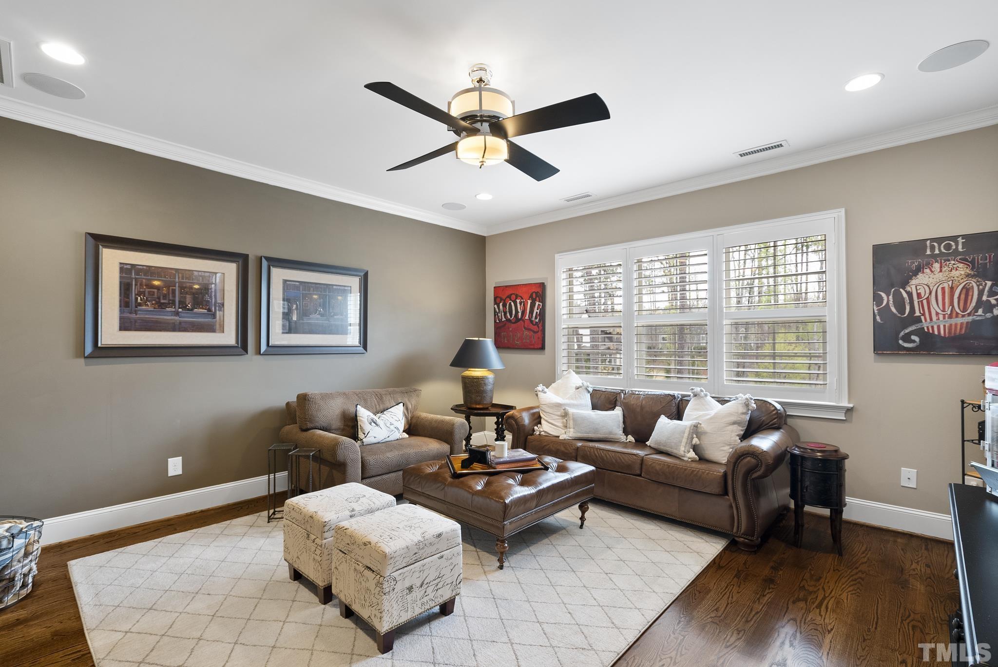 2524 Highgate Oak Drive Cary, NC 27519 - Photo 36 of 70 a living room with furniture and a large window