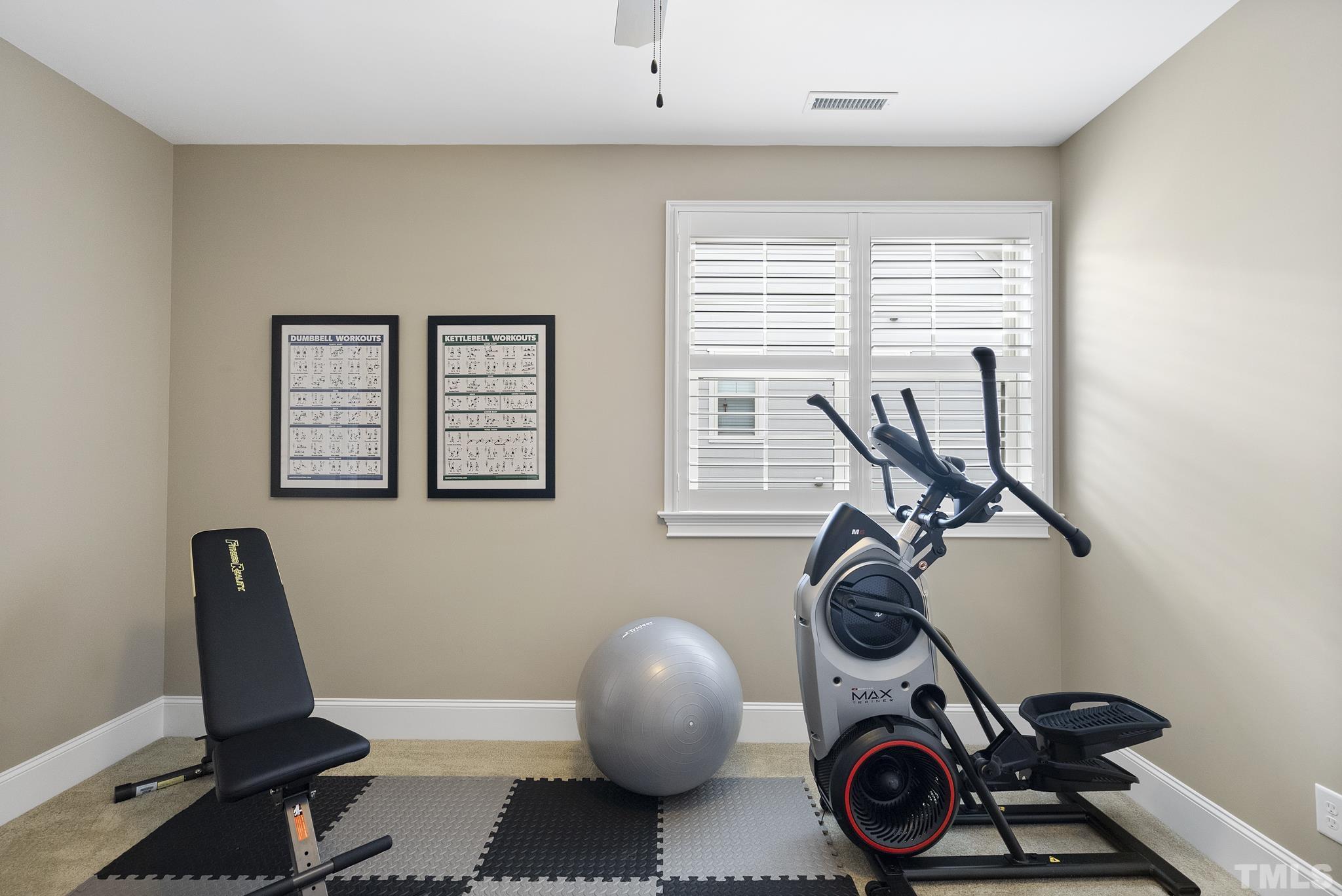 2524 Highgate Oak Drive Cary, NC 27519 - Photo 42 of 70 a view of a room with gym equipment