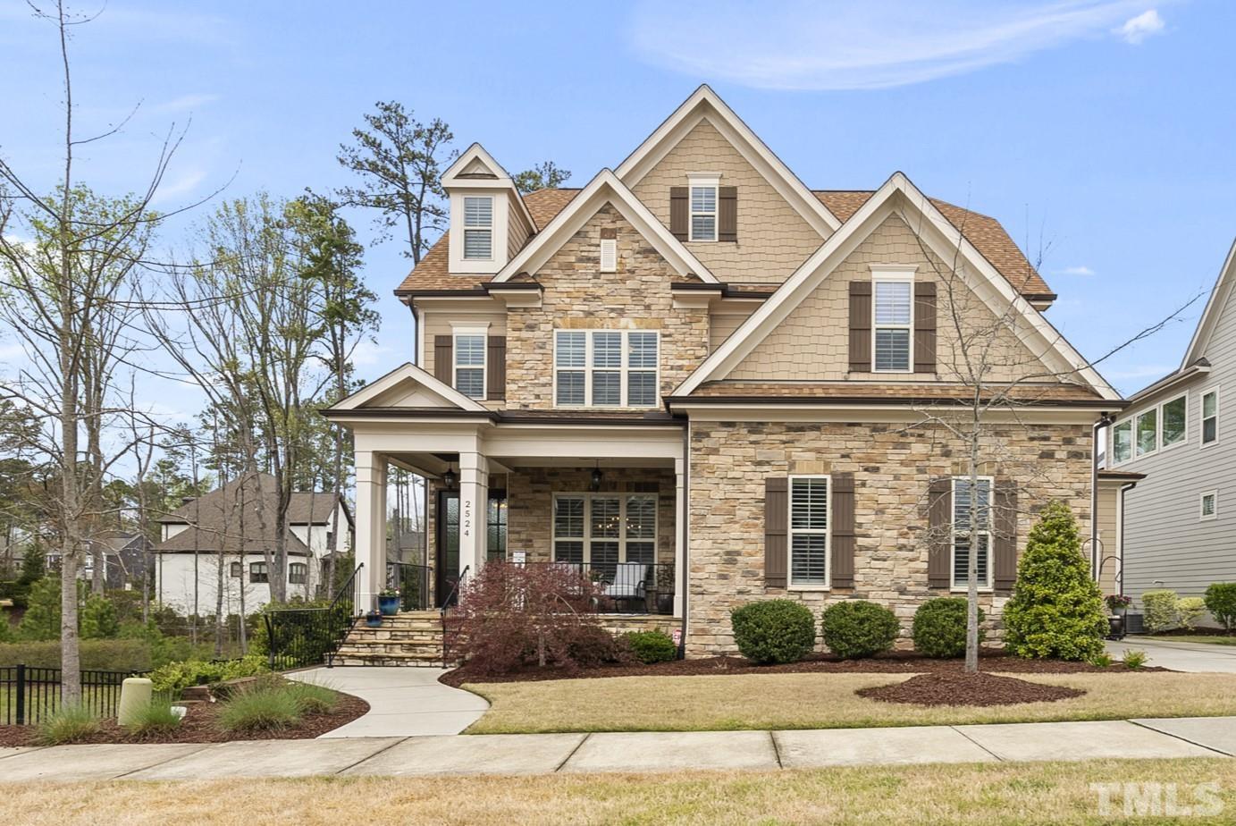 2524 Highgate Oak Drive Cary, NC 27519 - Photo 5 of 70 a front view of a house with a yard