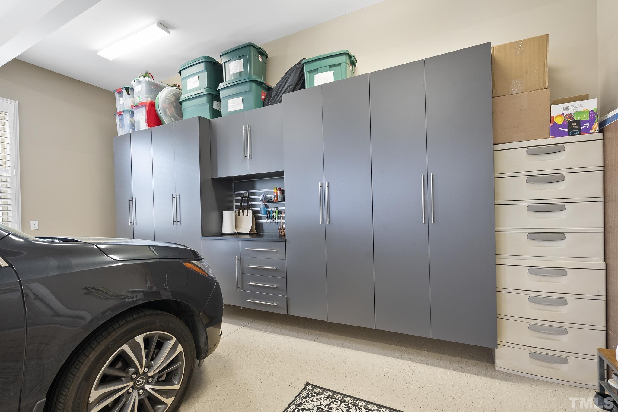 2524 Highgate Oak Drive Cary, NC 27519 - Photo 62 of 70 a kitchen with a refrigerator and cabinets