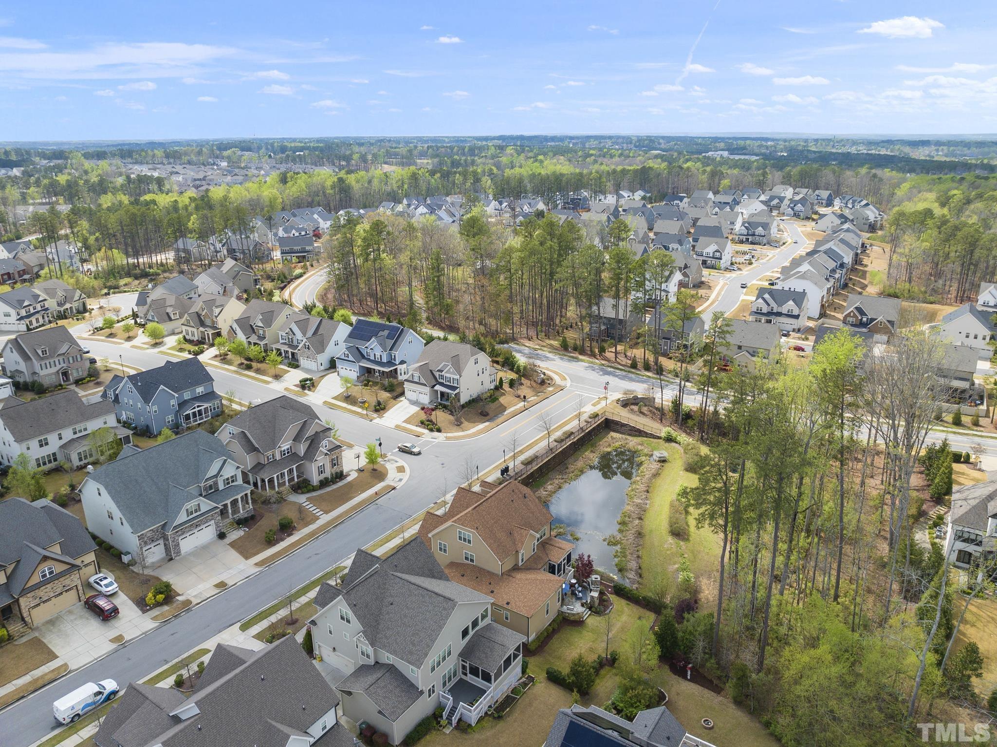 2524 Highgate Oak Drive Cary, NC 27519 - Photo 8 of 70 an aerial view of lake and residential houses with outdoor space