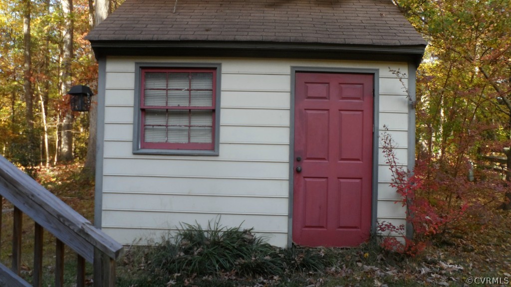9748 Kendrick Road Chesterfield, VA 23236 - Photo 17 of 18 a view of a wooden door of the house
