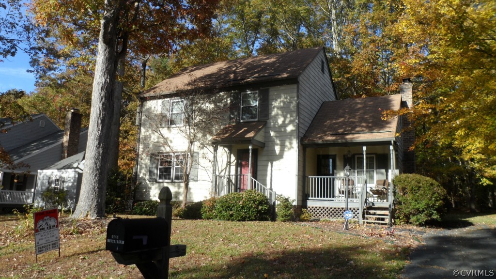 9748 Kendrick Road Chesterfield, VA 23236 - Photo 2 of 18 a front view of a house with a tree