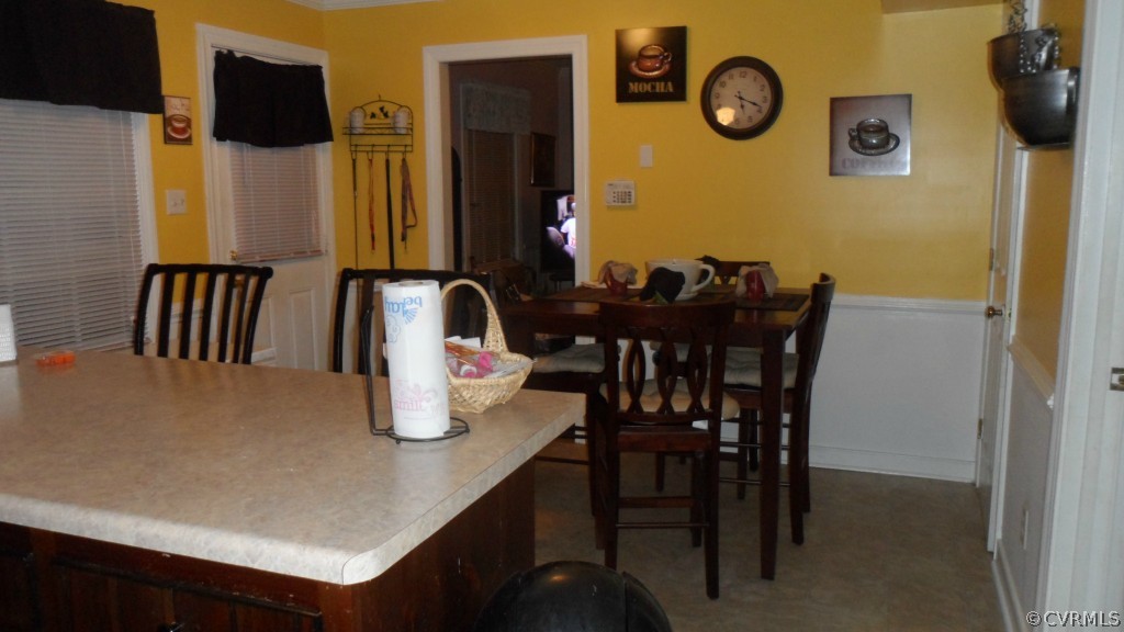 9748 Kendrick Road Chesterfield, VA 23236 - Photo 3 of 18 a dining room with furniture and wooden floor