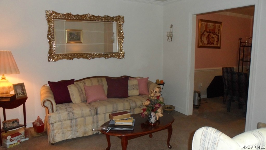 9748 Kendrick Road Chesterfield, VA 23236 - Photo 9 of 18 a living room with furniture and a mirror