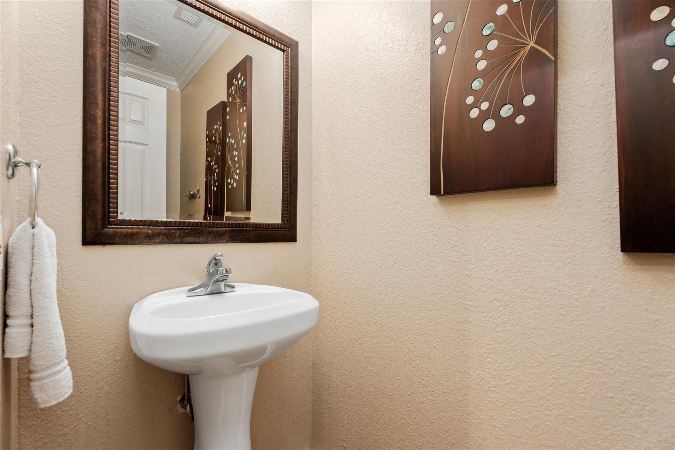 10205 Fostoria Road Cleveland, TX 77328 - Photo 18 of 44 a bathroom with a sink and mirror
