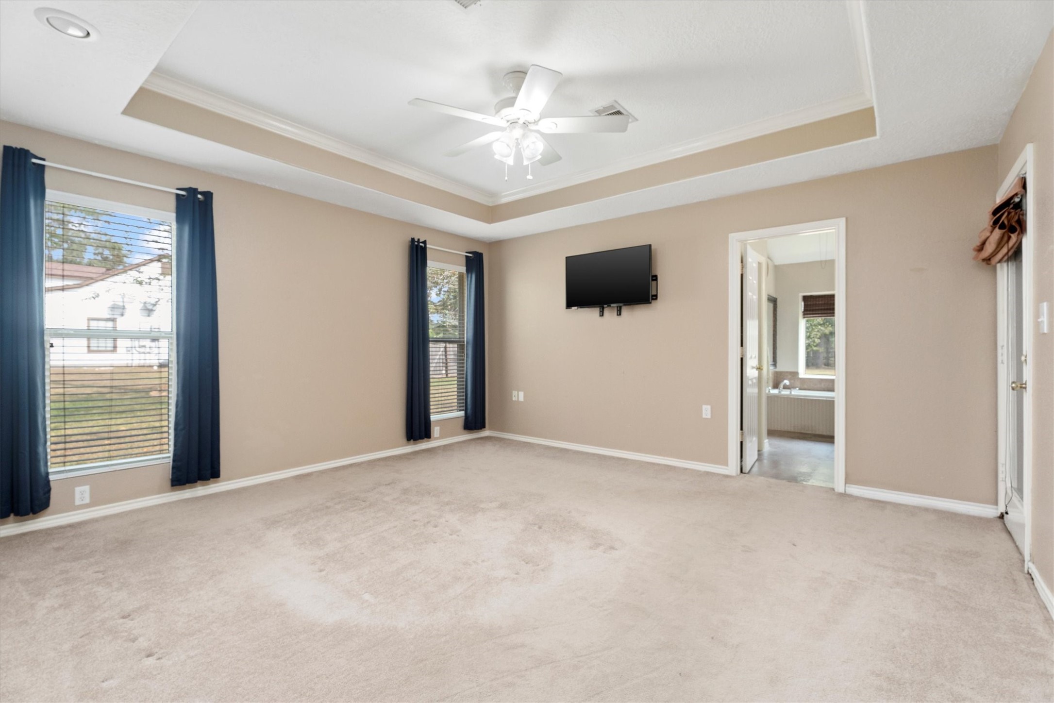 10205 Fostoria Road Cleveland, TX 77328 - Photo 23 of 44 a view of a livingroom with a flat screen tv