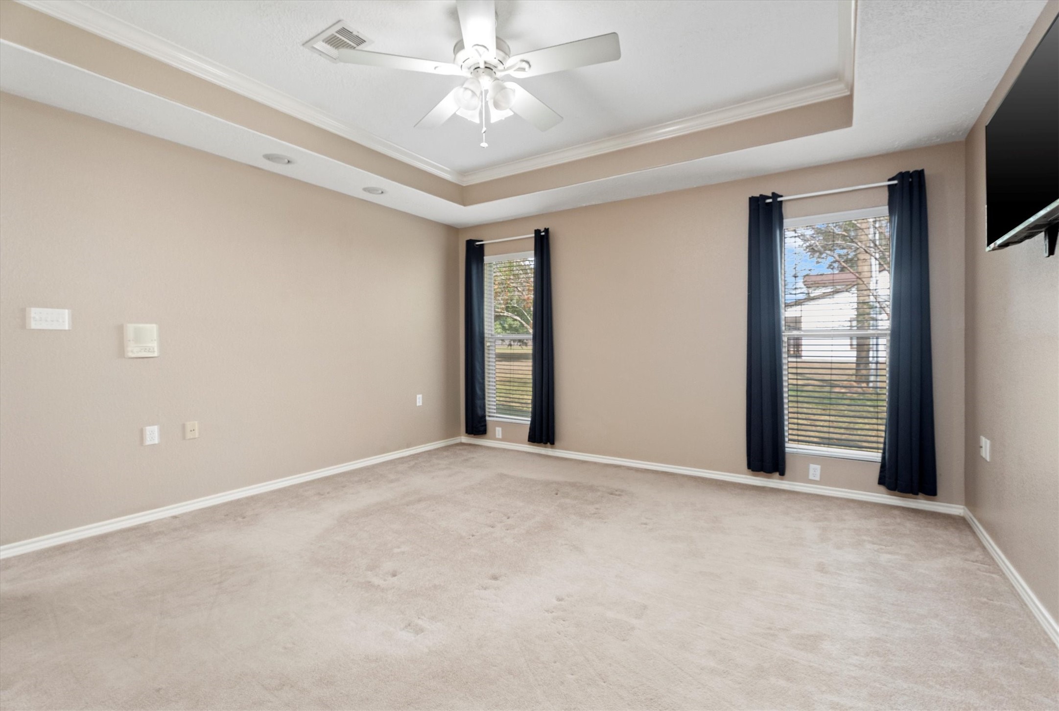 10205 Fostoria Road Cleveland, TX 77328 - Photo 24 of 44 a view of an empty room with a window