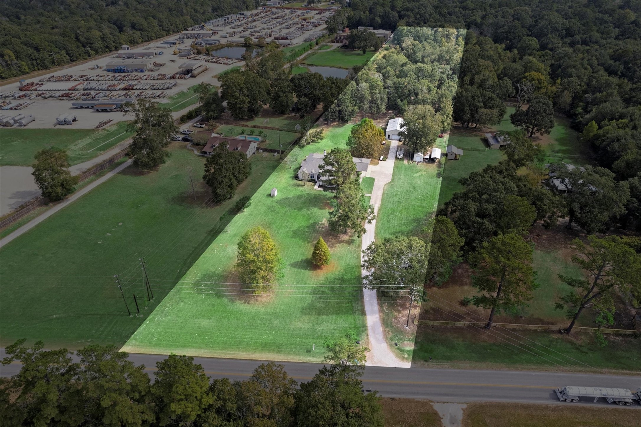 10205 Fostoria Road Cleveland, TX 77328 - Photo 43 of 44 an aerial view of a houses with outdoor space