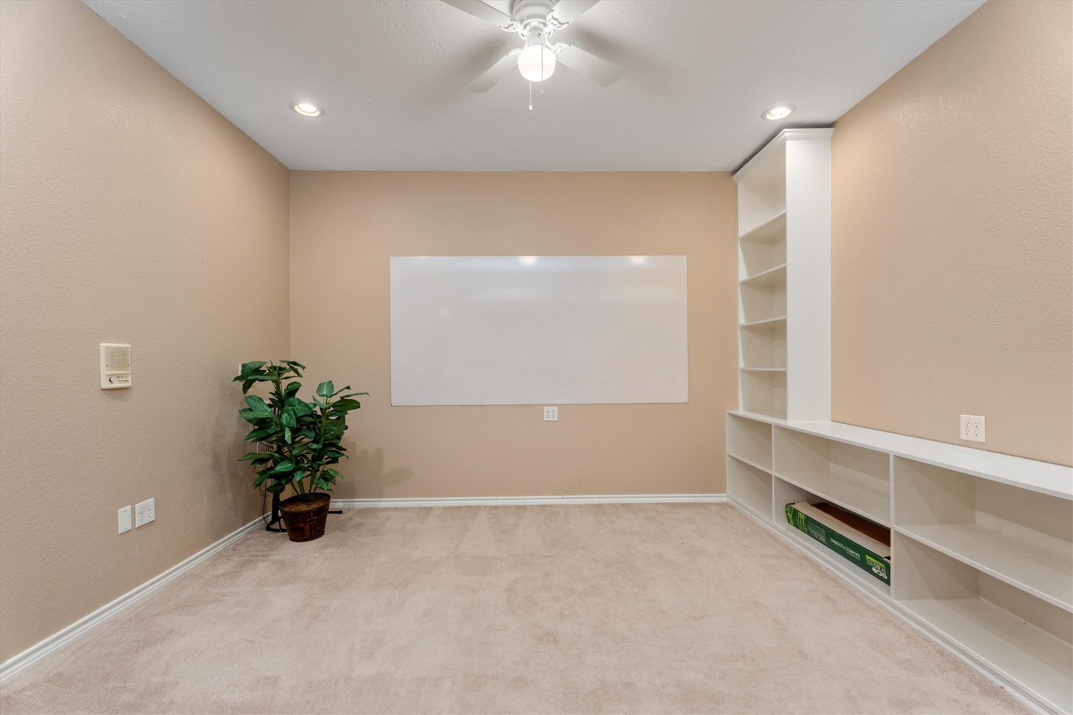 10205 Fostoria Road Cleveland, TX 77328 - Photo 10 of 44 a view of an empty room with a window