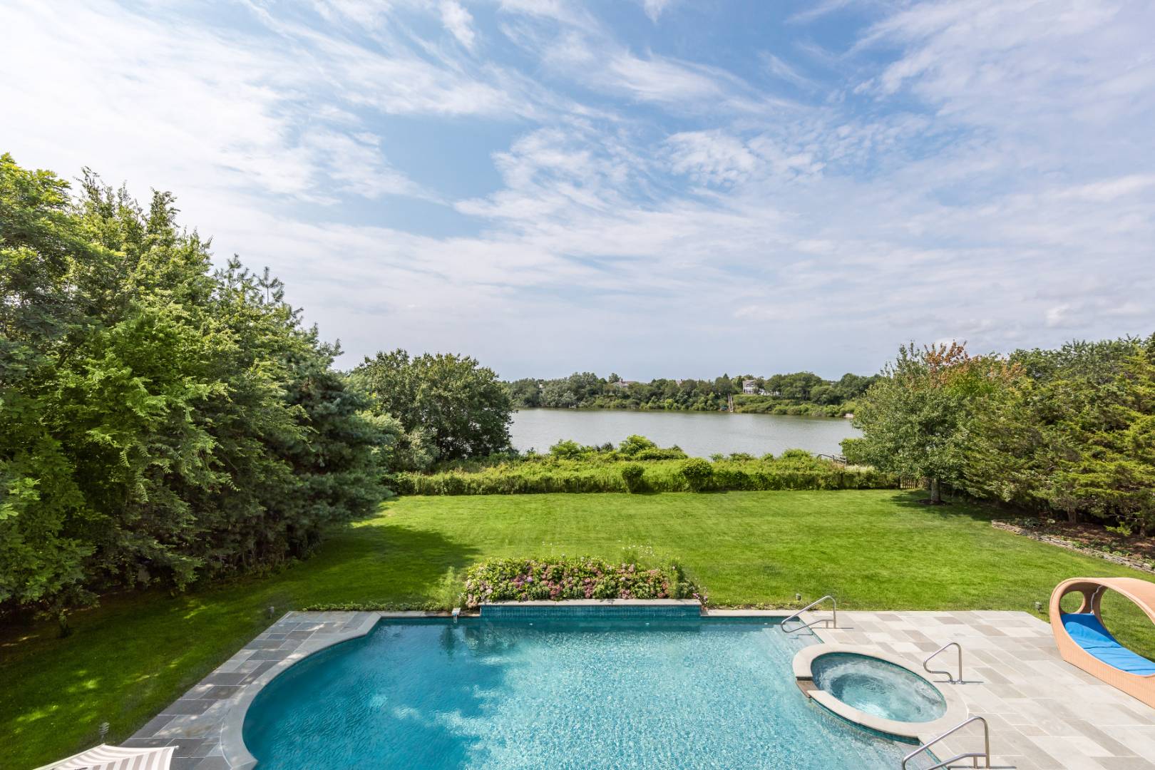 19 Kellis Way Bridgehampton, NY 11932 - Photo 2 of 26 a view of a lake with a yard