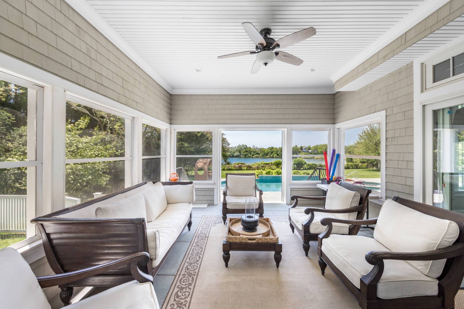 19 Kellis Way Bridgehampton, NY 11932 - Photo 15 of 26 a living room with furniture and a large window