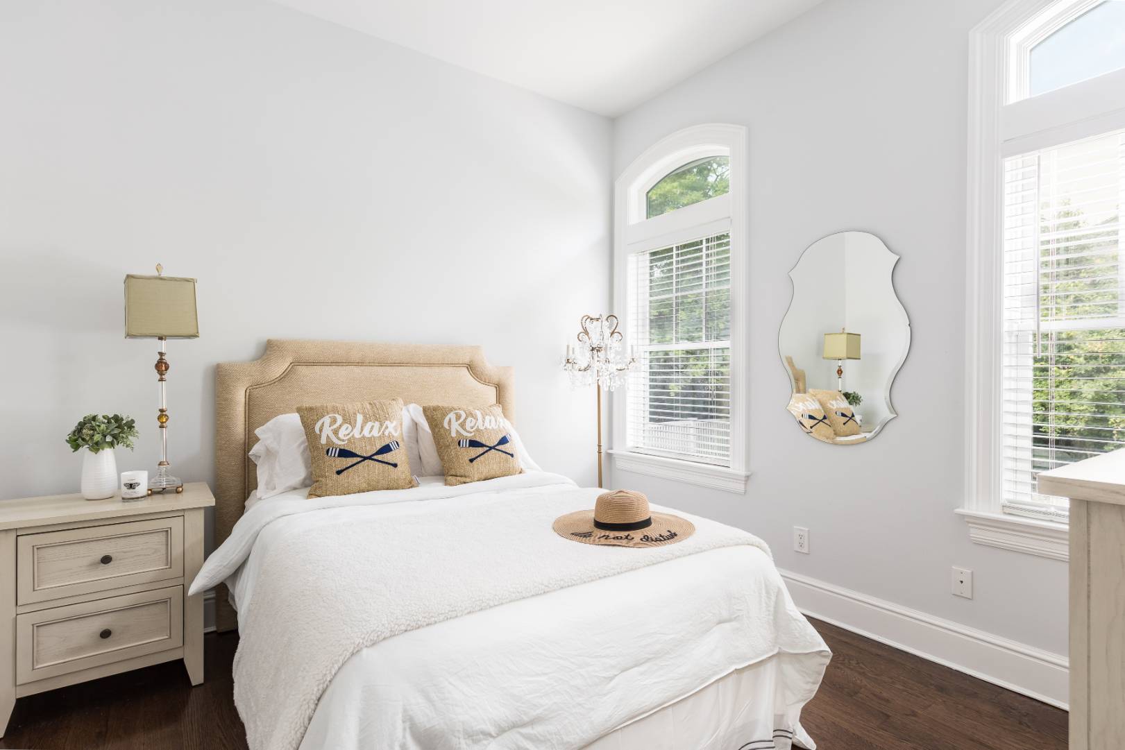 19 Kellis Way Bridgehampton, NY 11932 - Photo 23 of 26 a bedroom with a bed and a window