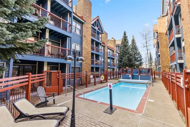 a view of a building with sitting area