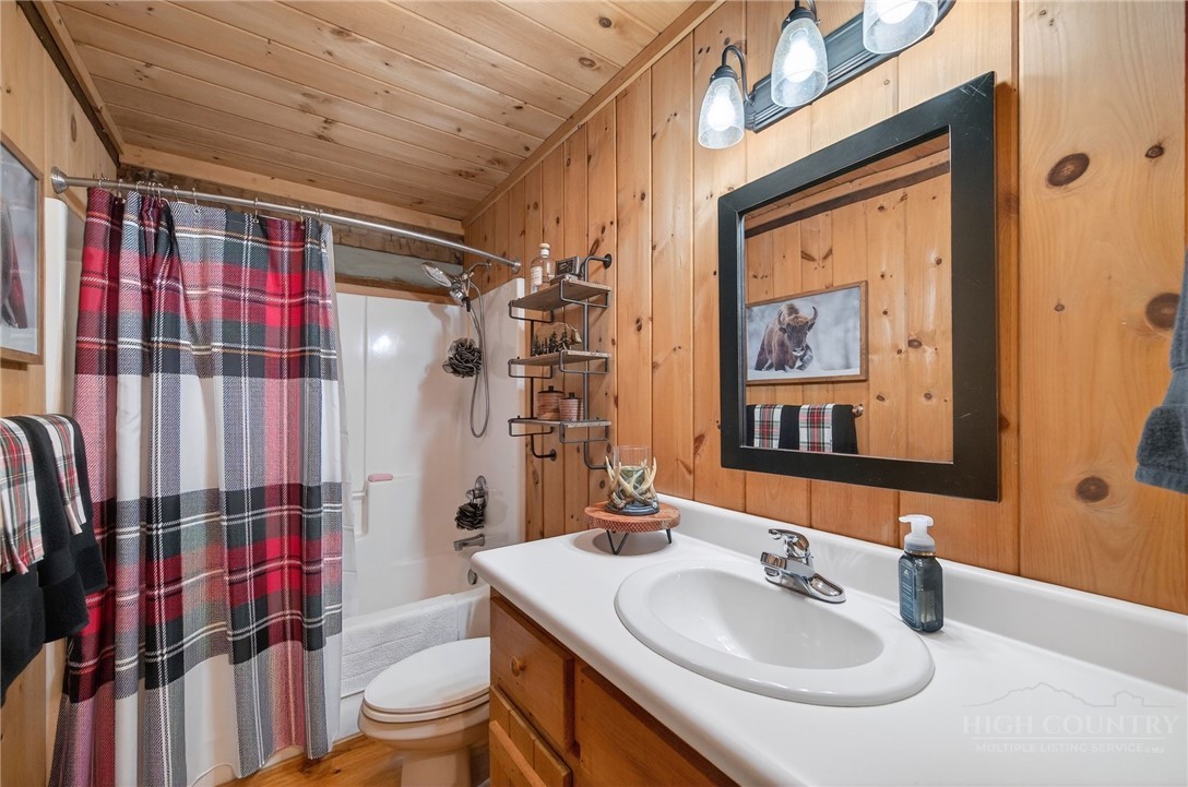 376 Yellow Bear Road Todd, NC 28684 - Photo 14 of 29 a bathroom with a sink toilet and shower