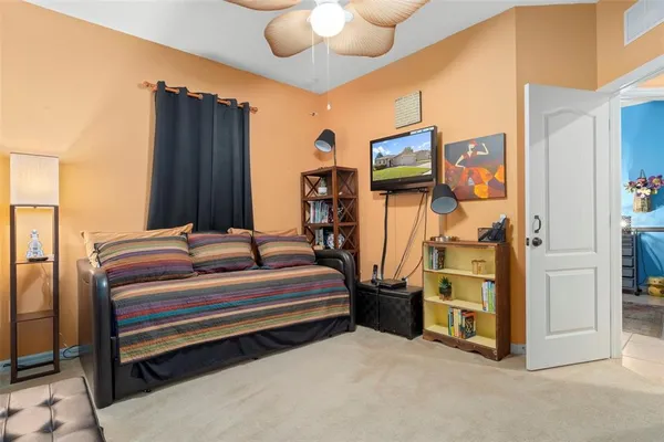 a bathroom with a sink a mirror and shower curtain