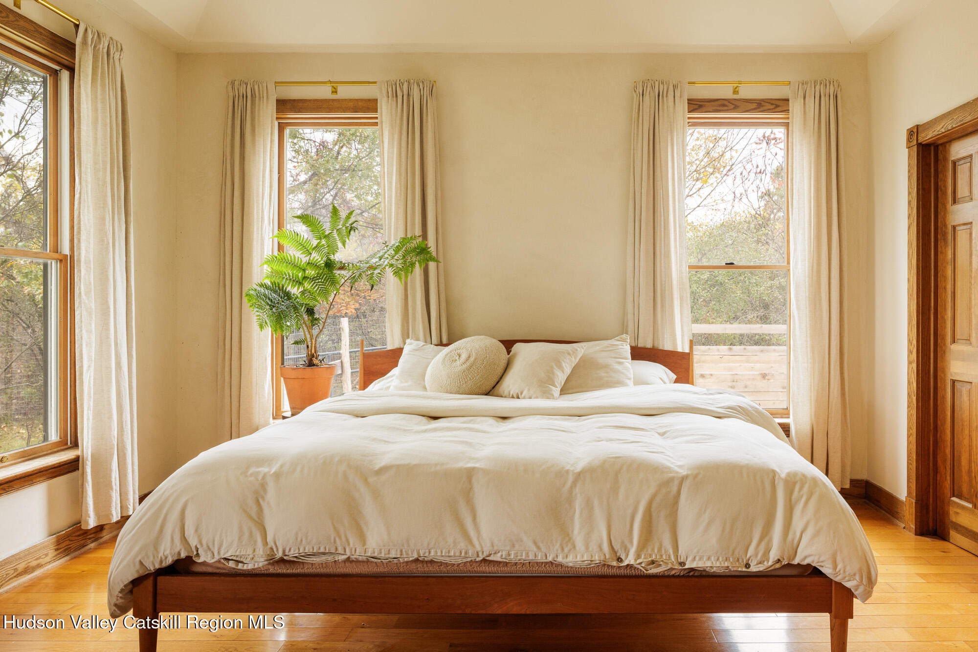 191 Farm To Market Road Athens, NY 12015 - Photo 12 of 31 a large bed sitting in a bedroom next to a window