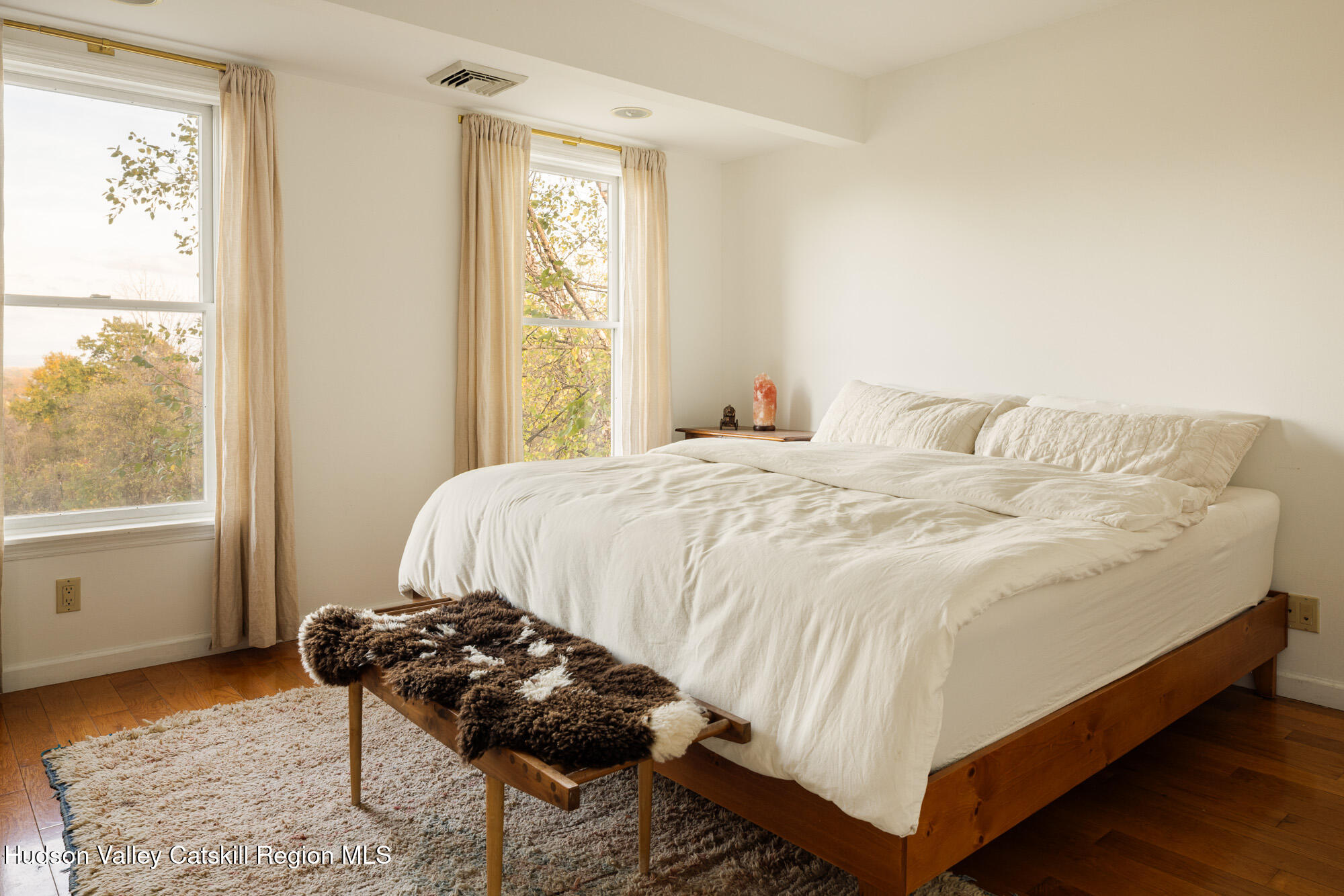 191 Farm To Market Road Athens, NY 12015 - Photo 14 of 31 a bedroom with a bed a chair and next to a window