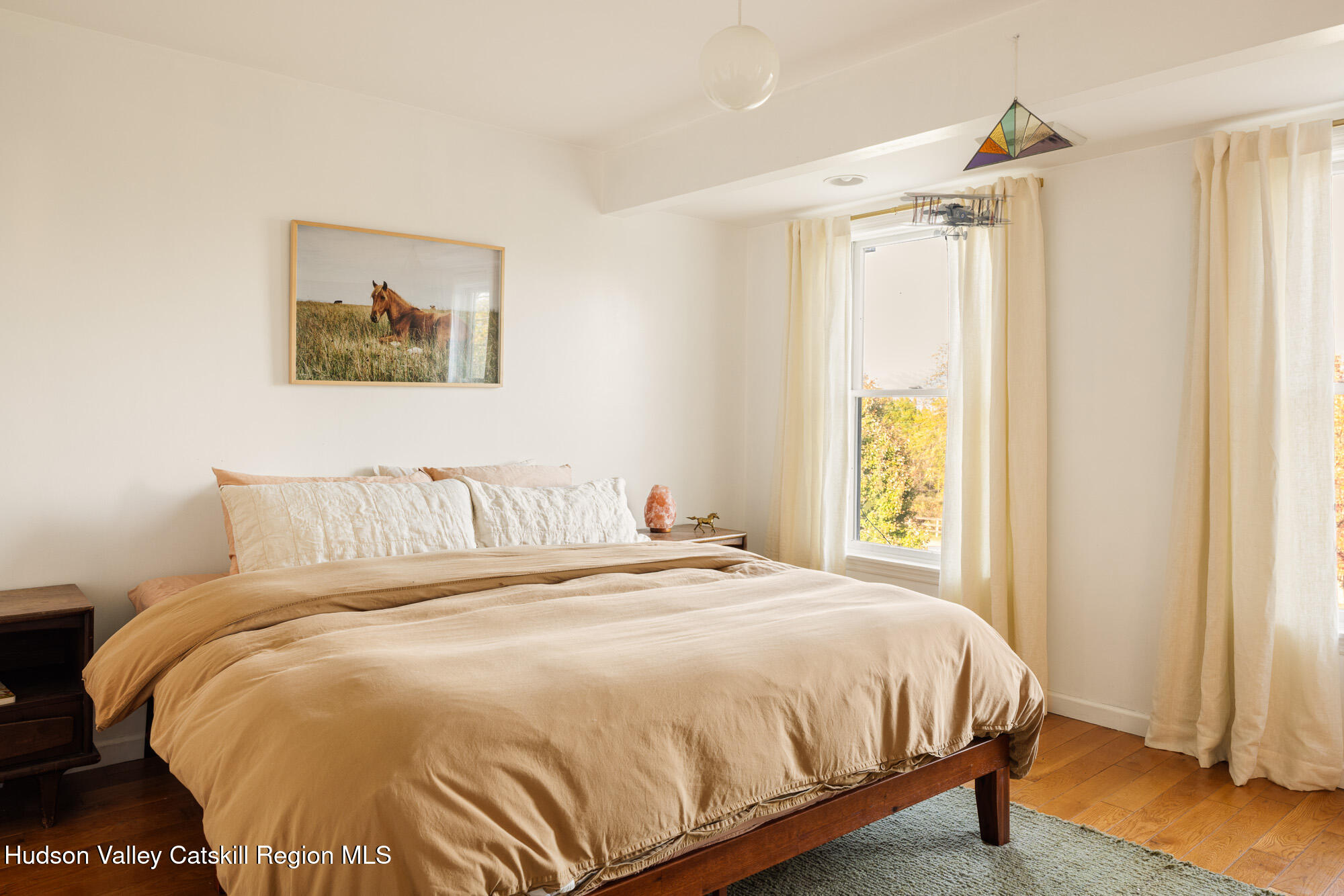 191 Farm To Market Road Athens, NY 12015 - Photo 15 of 31 a bedroom with a bed and a window